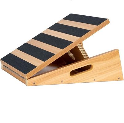 Tavola di legno inclinata per la riabilitazione artistica