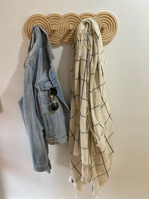 Cappelli e borse in salotto