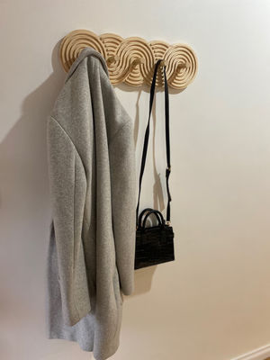 Cappelli e borse in salotto