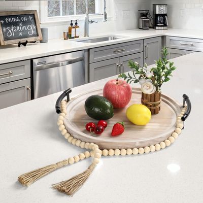 Piatto rotondo di legno a colori semplici per la cucina moderna