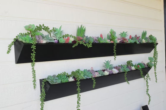 Piantone a parete in legno lungo quadrato per il moderno display di succoli in giardino interno all'aperto