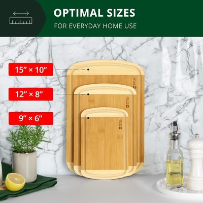 Set di tavola da taglio di legno di bambù rettangolare con accessori da cucina inclusi
