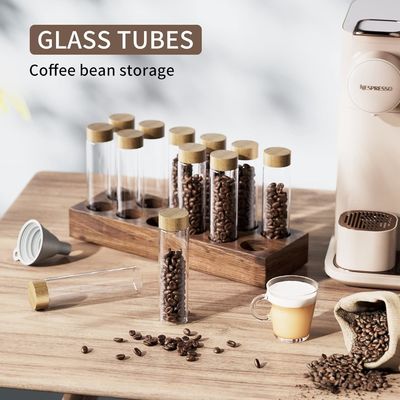 Contenitore per il deposito di chicchi di caffè in legno versatile con tubo per singola dose e supporto per portacaffè