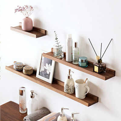 Ripiano galleggiante in legno massello montato a parete