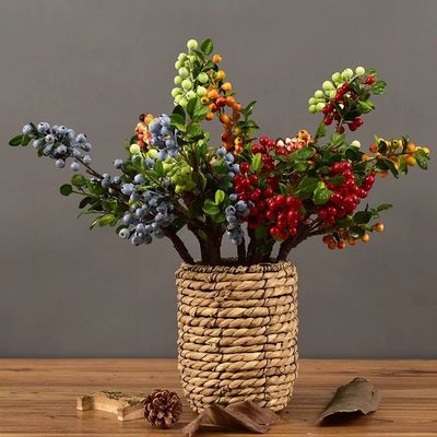 Fabbricazione artificiale di bacche di Natale
