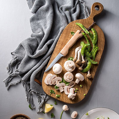 Tavola di pane di legno di noce nera per frutta e porzione 40x23cm