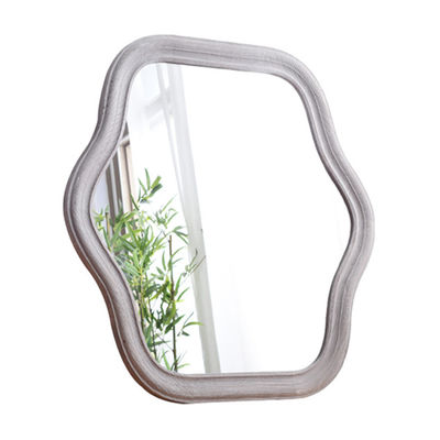 Specchio da camera da letto con telaio ondulato e logo personalizzato